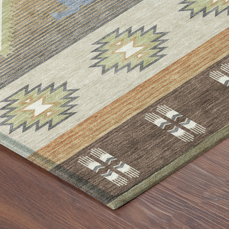 Corner view of southwestern area rug with woven stripes and diamond icons