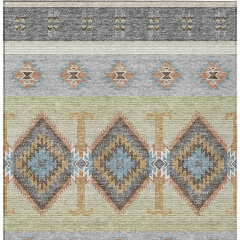 Southwestern area rug with gray base, light cream bands, blue zigzags, and multicolor diamonds