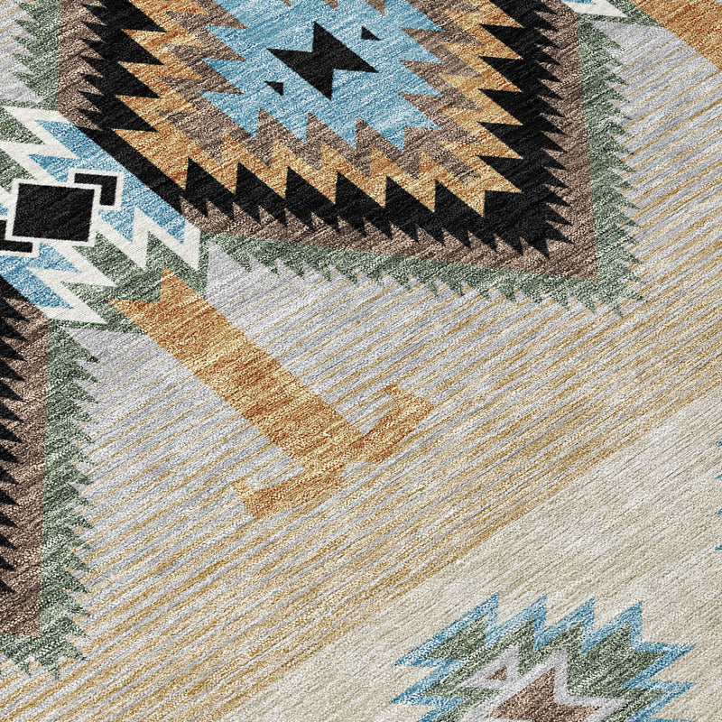 Southwestern area rug close-up with blue, tan, and black zigzag diamond pattern