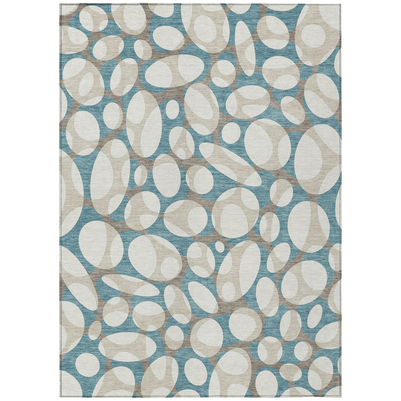 Teal blue and ivory abstract indoor outdoor rug with oval dot motif