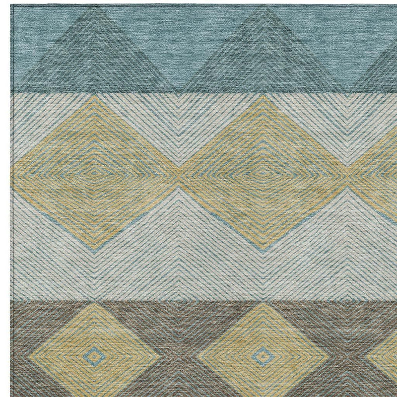 Teal and gold striped chevron area rug with diamond motif sections
