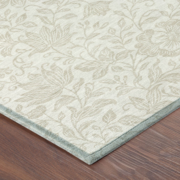 Ivory floral rug with beige pattern and light blue border edge