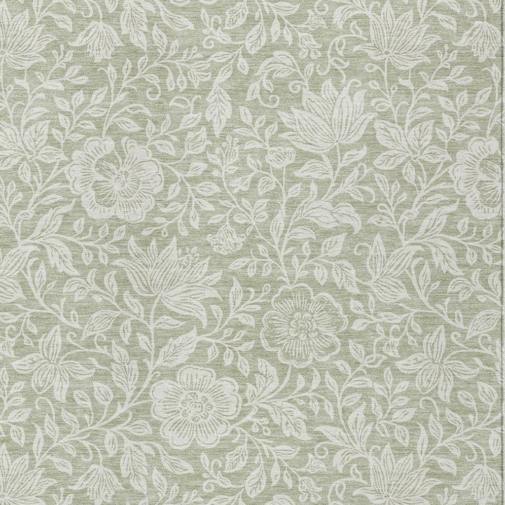 Green and ivory floral area rug with leaf and flower pattern, flat woven look