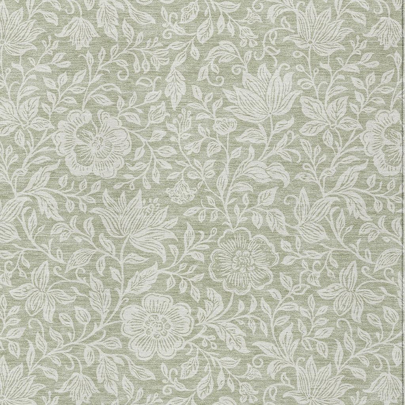 Green and ivory floral area rug with leaf and flower pattern, flat woven look
