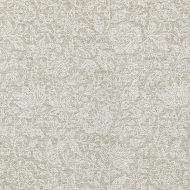 Ivory area rug with repeating beige floral rosettes and leaf pattern