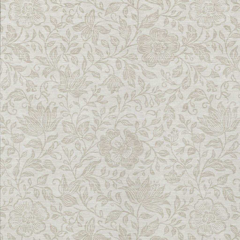 Ivory and beige floral area rug with scattered blossoms and vine details