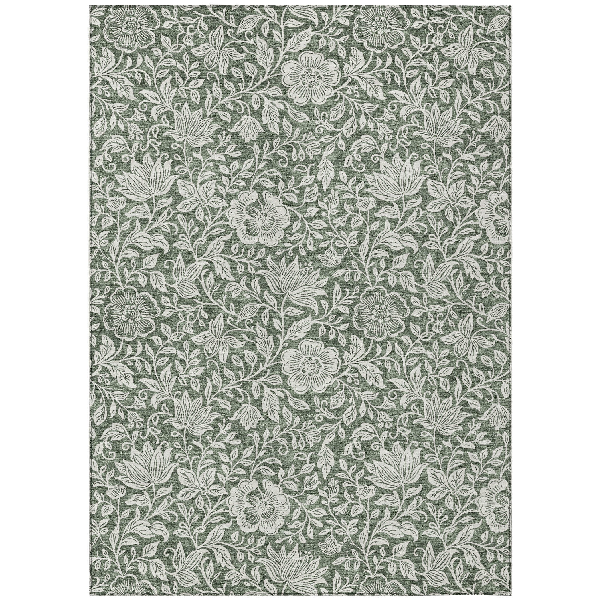 Green indoor outdoor area rug with ivory floral leaf pattern