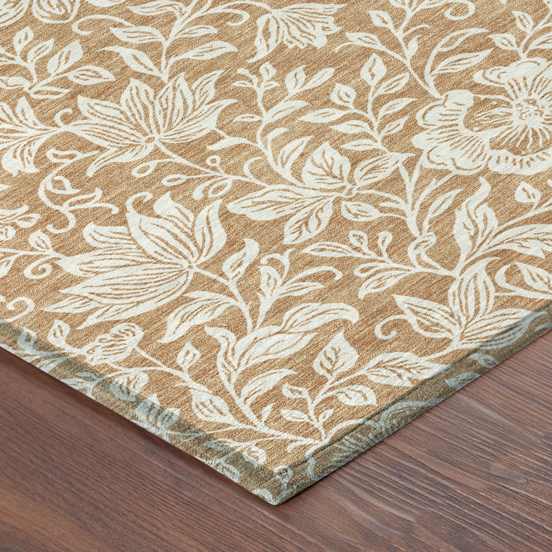 Corner view of round area rug, copper-brown with ivory floral pattern and bound edge