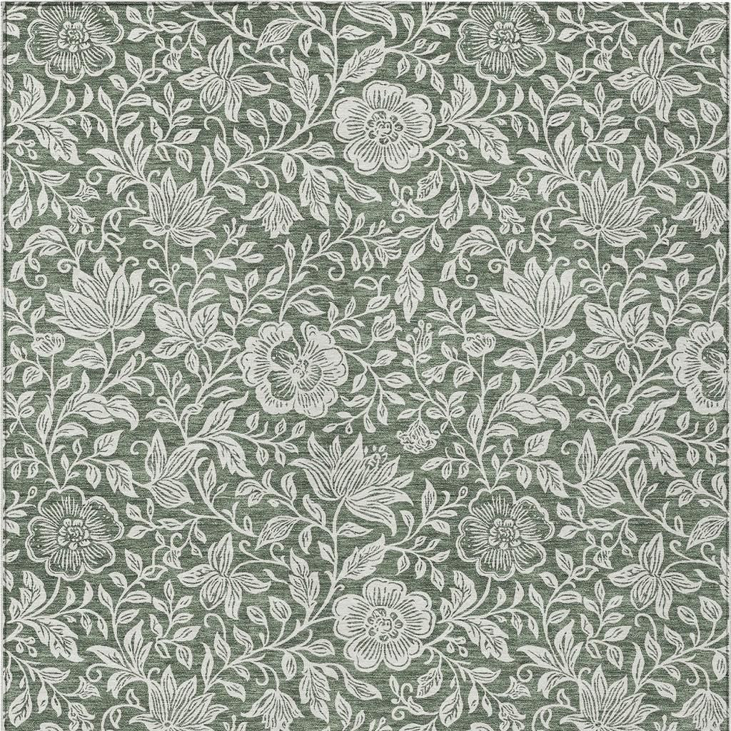 Green rug with dense ivory flower and leafy vine motif, repeating botanical pattern.