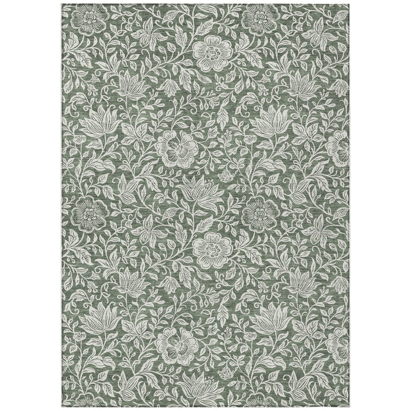 Green rectangular rug with ivory floral and leaf pattern, repeating botanical design.