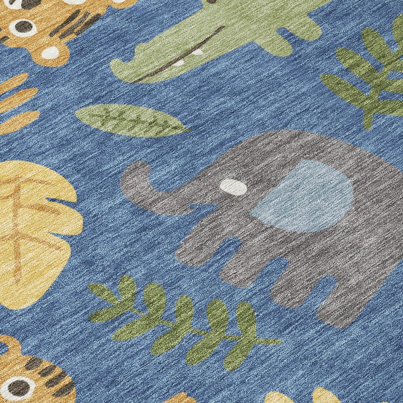 Abstract area rug close-up with blue texture and beige, green, and gray animal motifs.