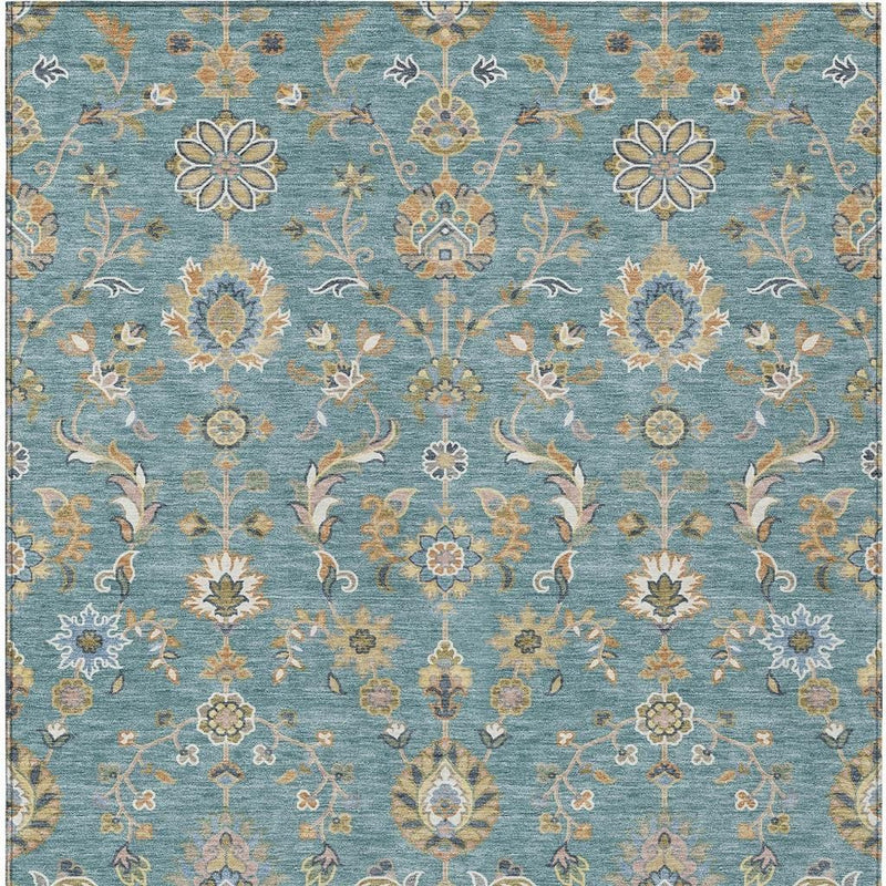 Teal blue rug with cream and taupe damask floral motifs and scrolling vine accents