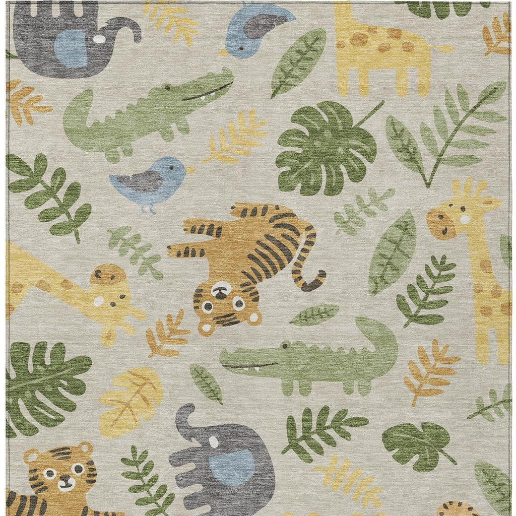 Beige area rug with green, yellow, blue, and gray jungle animal abstract pattern