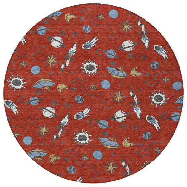 Red round area rug with blue, ivory, and sun, planet, rocket, and star pattern