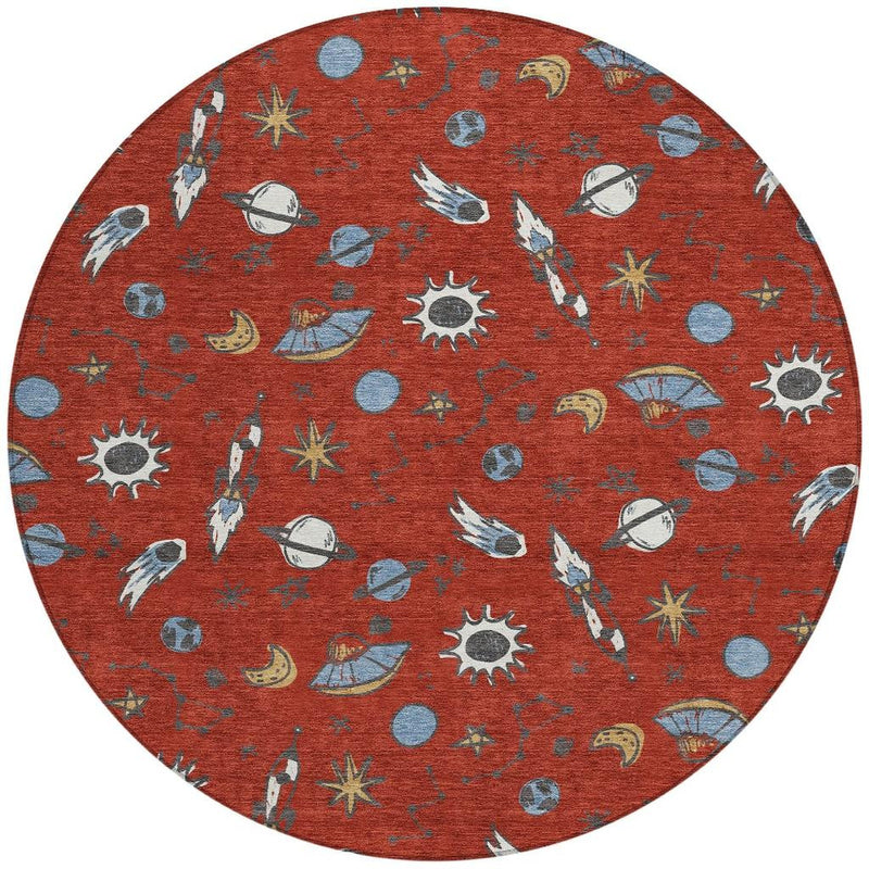 Red round area rug with repeating blue and ivory space motifs, birdlike and rocket details