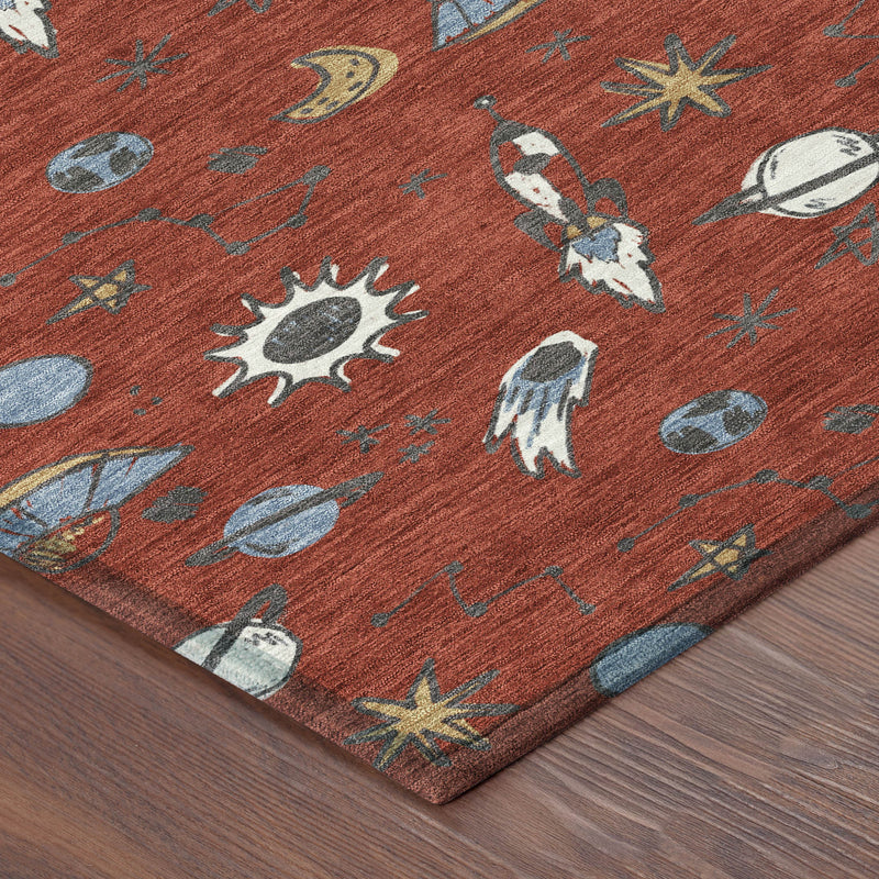 Red round area rug corner with space-themed pattern on a wood floor surface