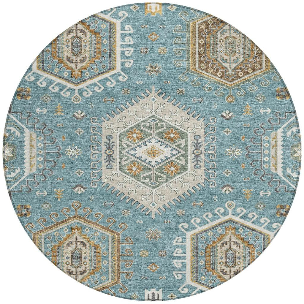 Round area rug featuring teal blue, ivory, and multicolor tribal geometric panels