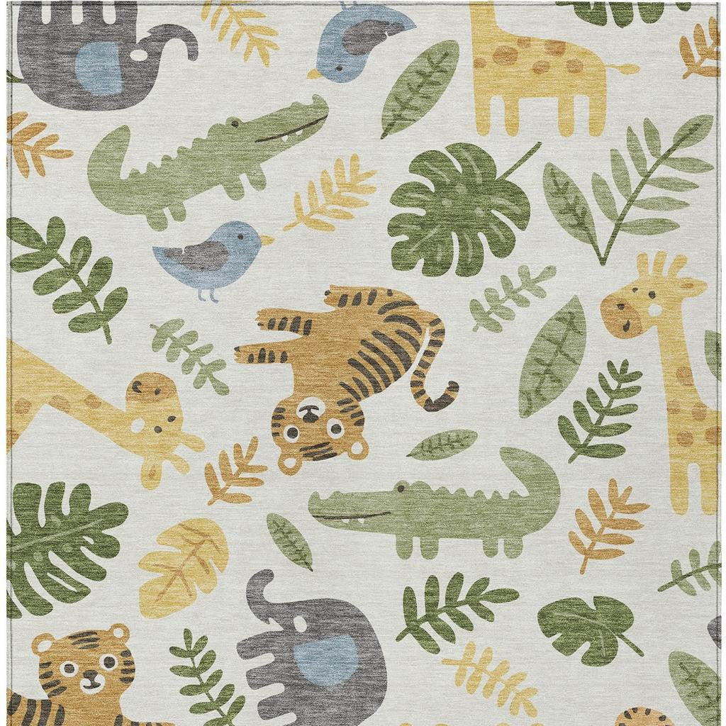 Ivory abstract indoor/outdoor area rug with colorful animal silhouettes and leaves