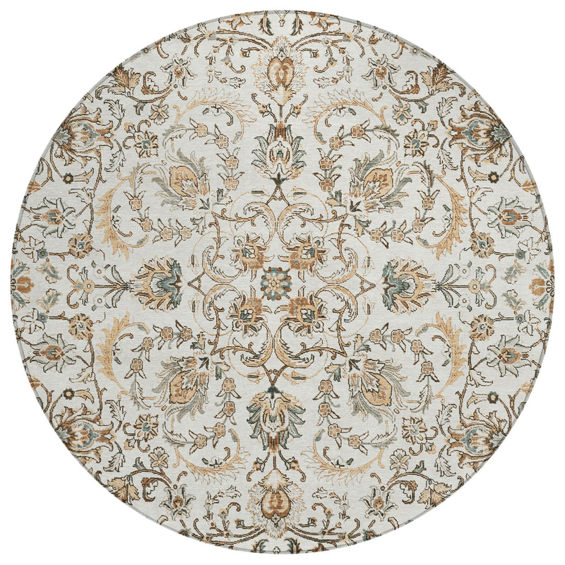 Round ivory area rug with centered medallion and botanical leaf and flower pattern