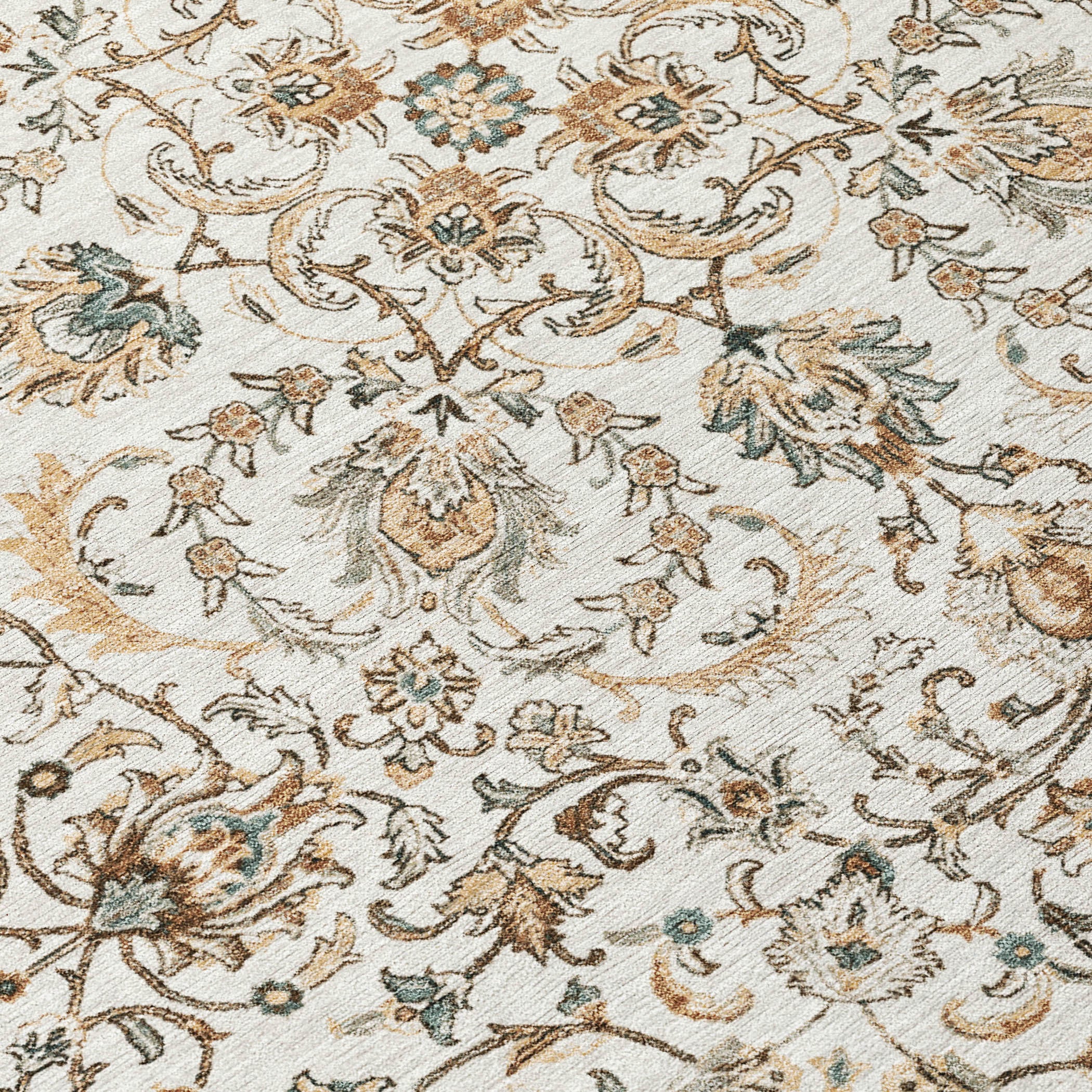 Close-up of ivory rug with detailed floral and vine motif in brown and teal