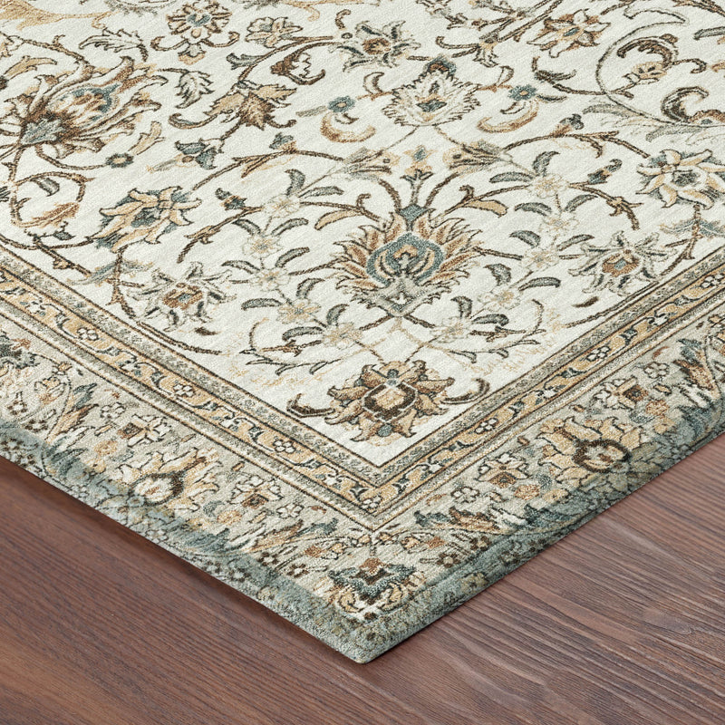 Corner of round rug with ornate border and botanical floral motif on light ivory