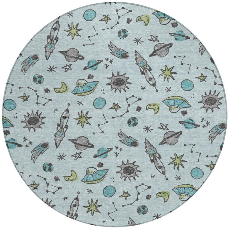 Light blue round rug with repeating space-animal motif, even pattern coverage.