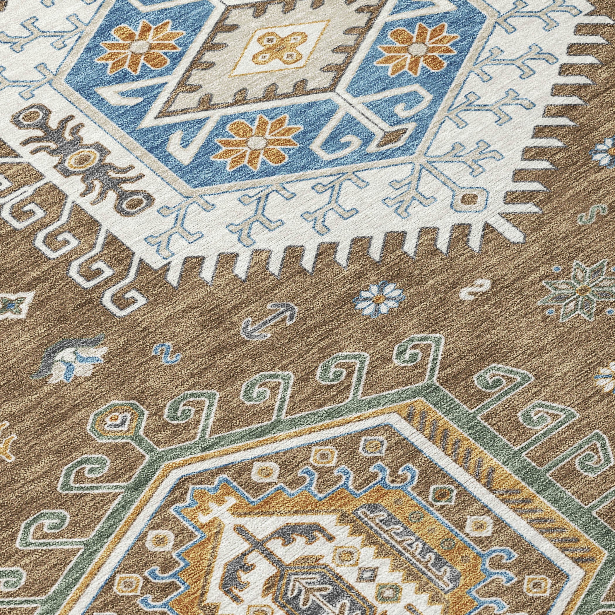 Geometric tribal area rug close-up with blue motifs, tan background, and short fringe edge