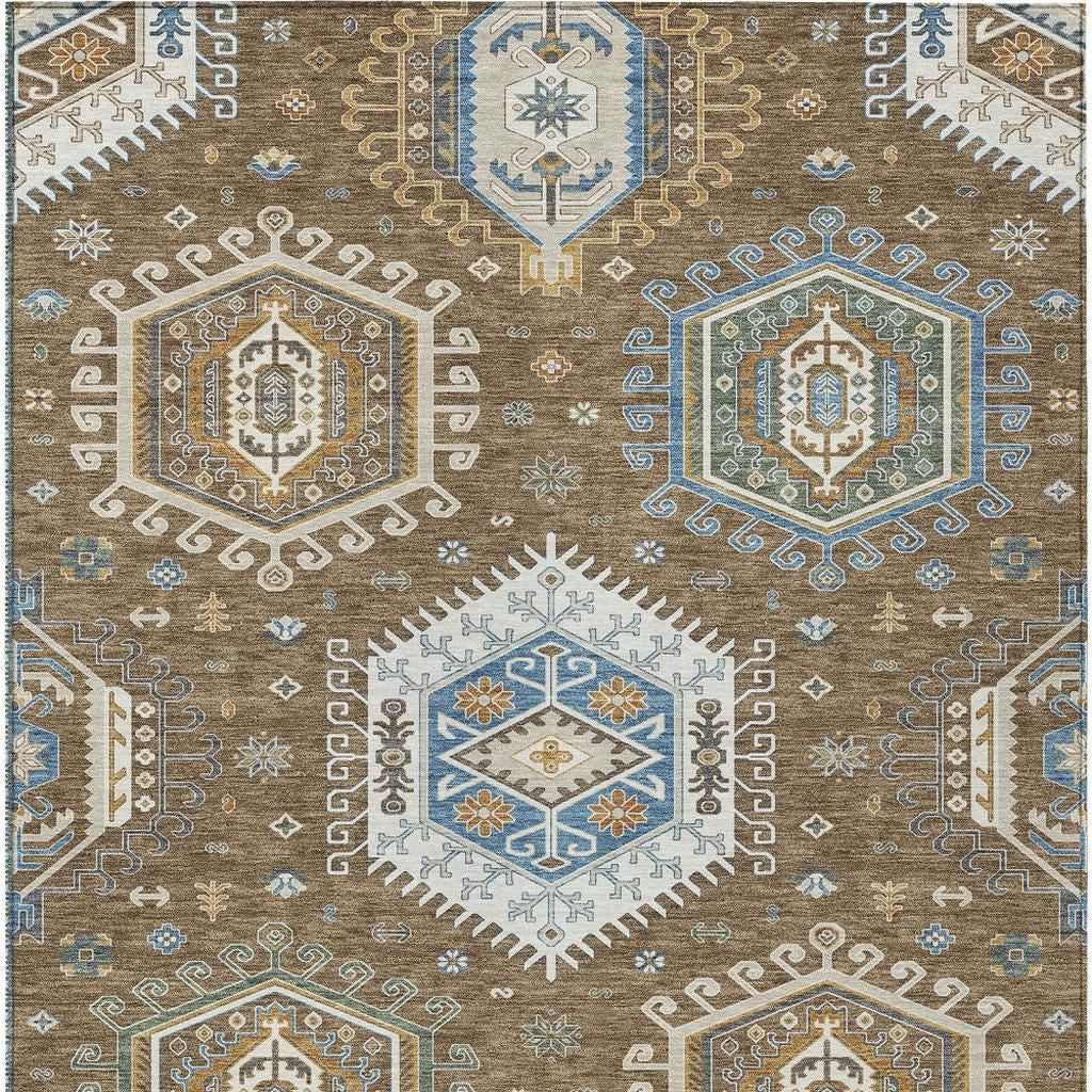 Brown tribal area rug with blue accents and central diamond medallion, flat patterned design