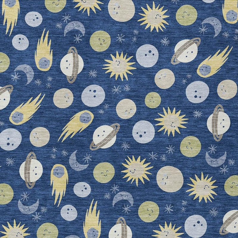 Navy blue area rug with scattered ivory planets, green moons, yellow suns, and star accents.