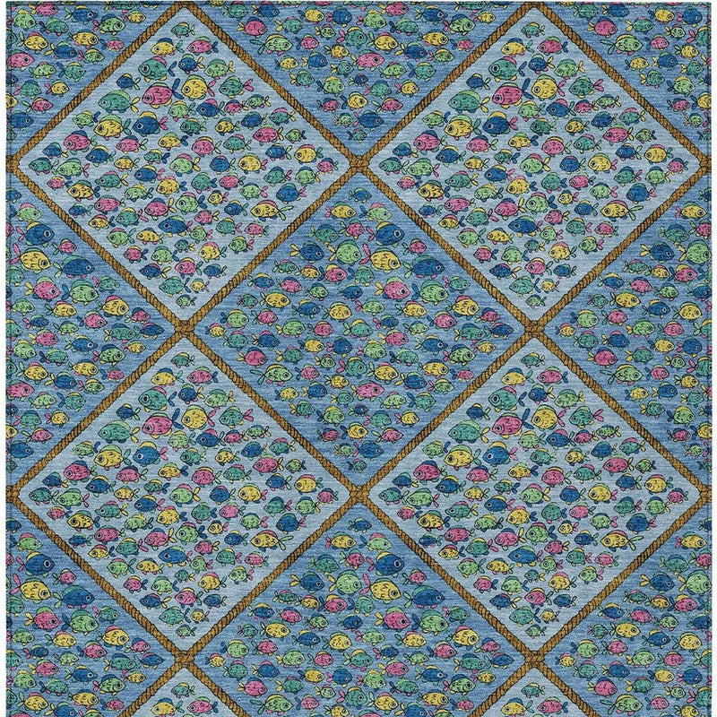 Blue area rug with diamond pattern of multicolor cartoon fish and gold trim