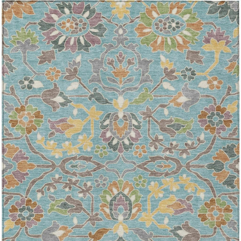 Teal blue floral area rug with multicolor leaf and flower pattern, washable