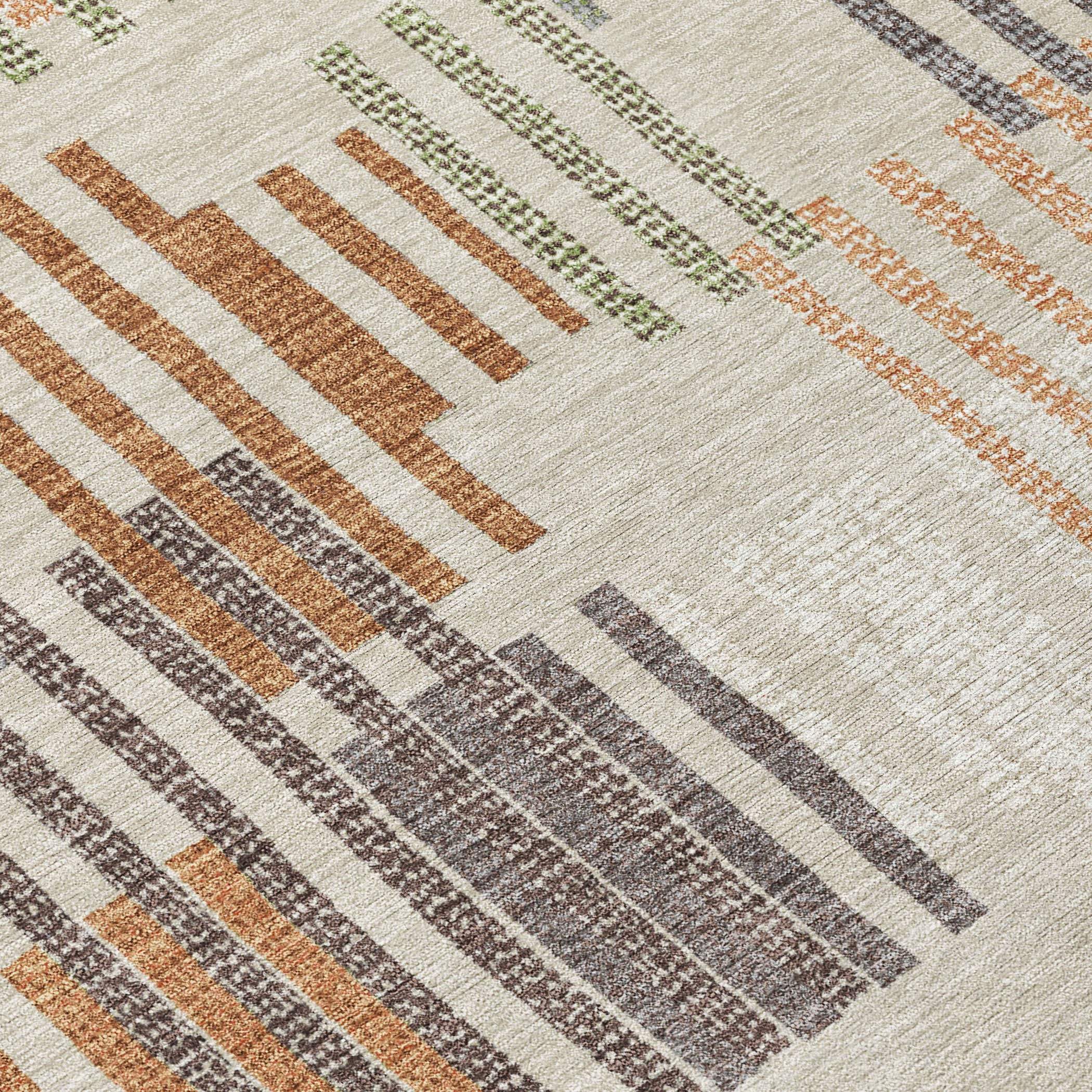 Multicolored geometric area rug in beige, brown, green, and orange tones, made of soft, durable synthetic fibers.