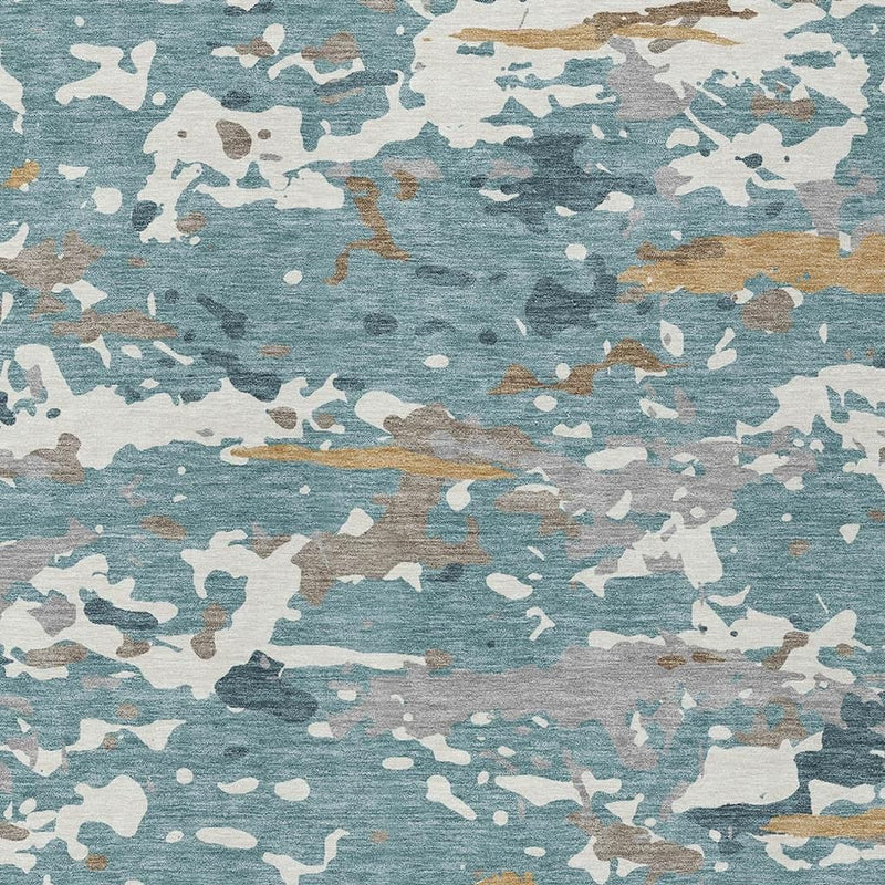 Abstract rug texture close-up: teal blue field with white and tan irregular shapes