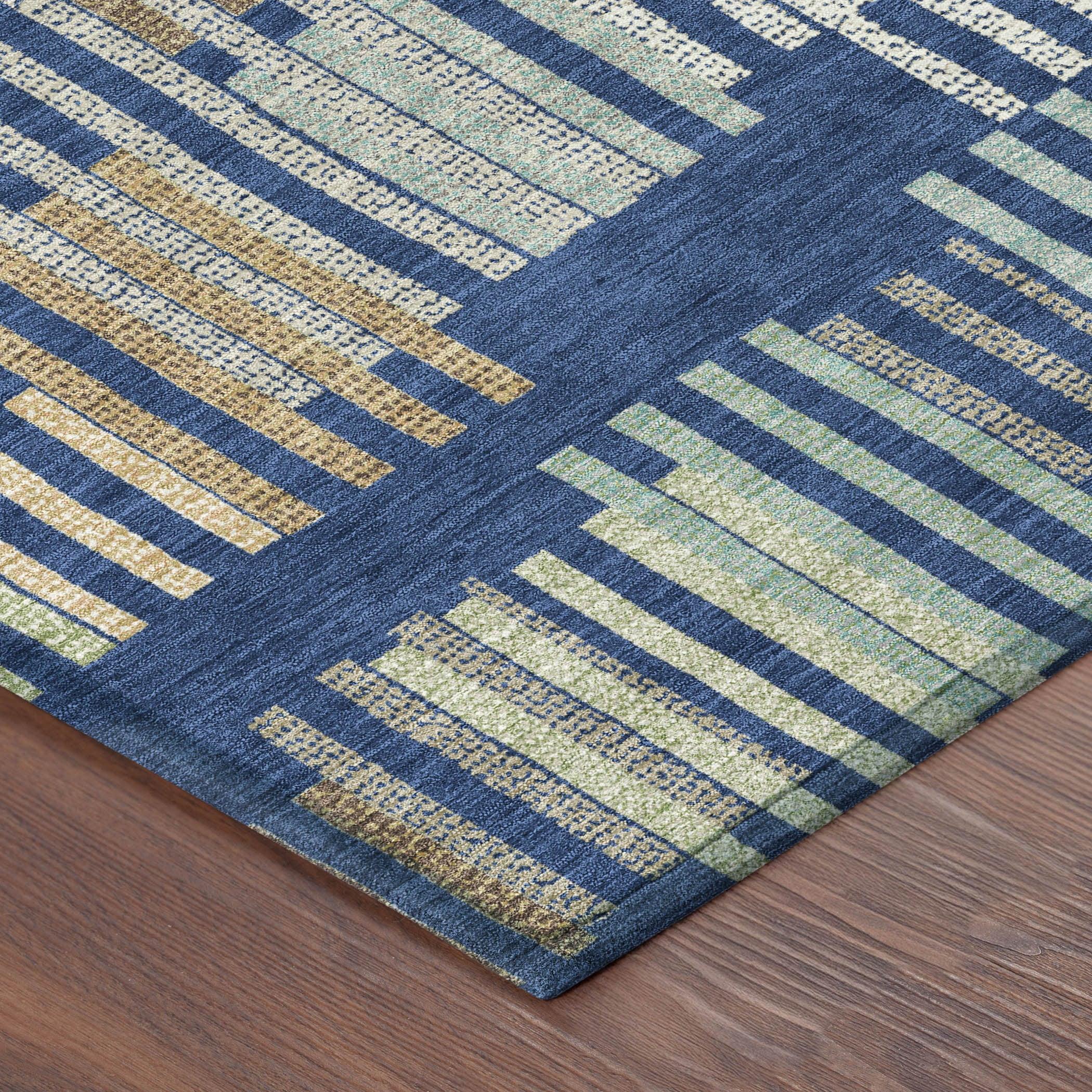 Navy blue and gold abstract patterned area rug, made of soft polyester, perfect for modern home décor.