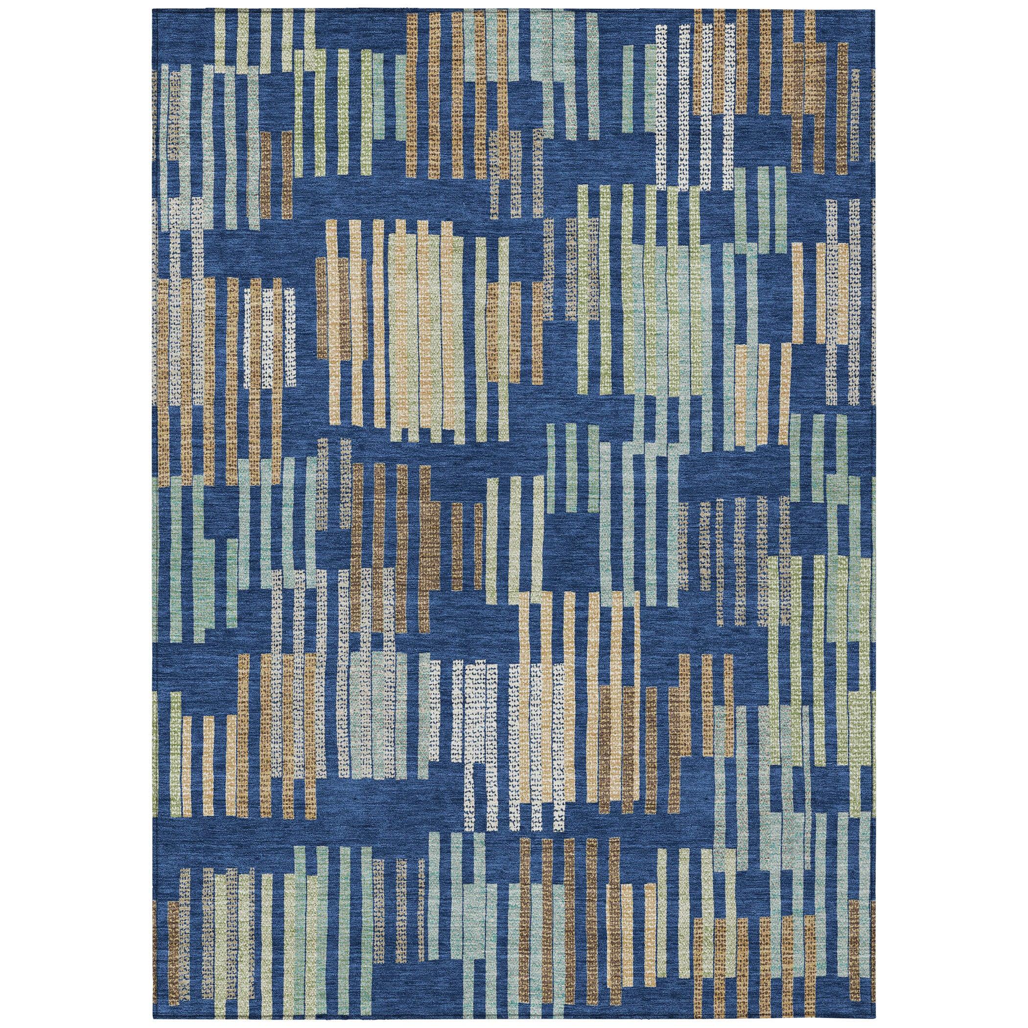 Abstract navy blue area rug with gold, green, and white patterns, made from durable, high-quality materials.