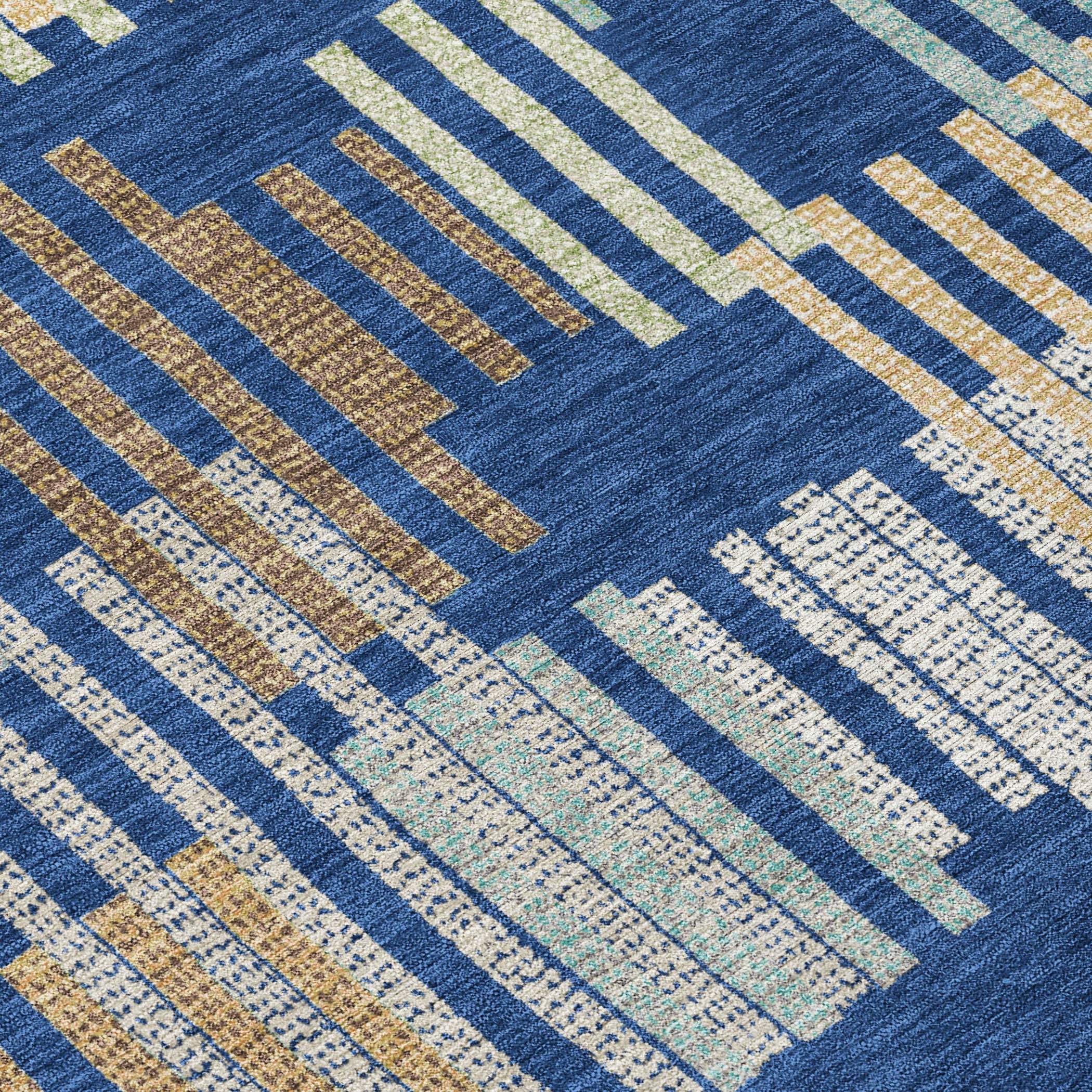 Navy blue area rug with geometric patterns in beige, gold, and cream, perfect for modern home decor.