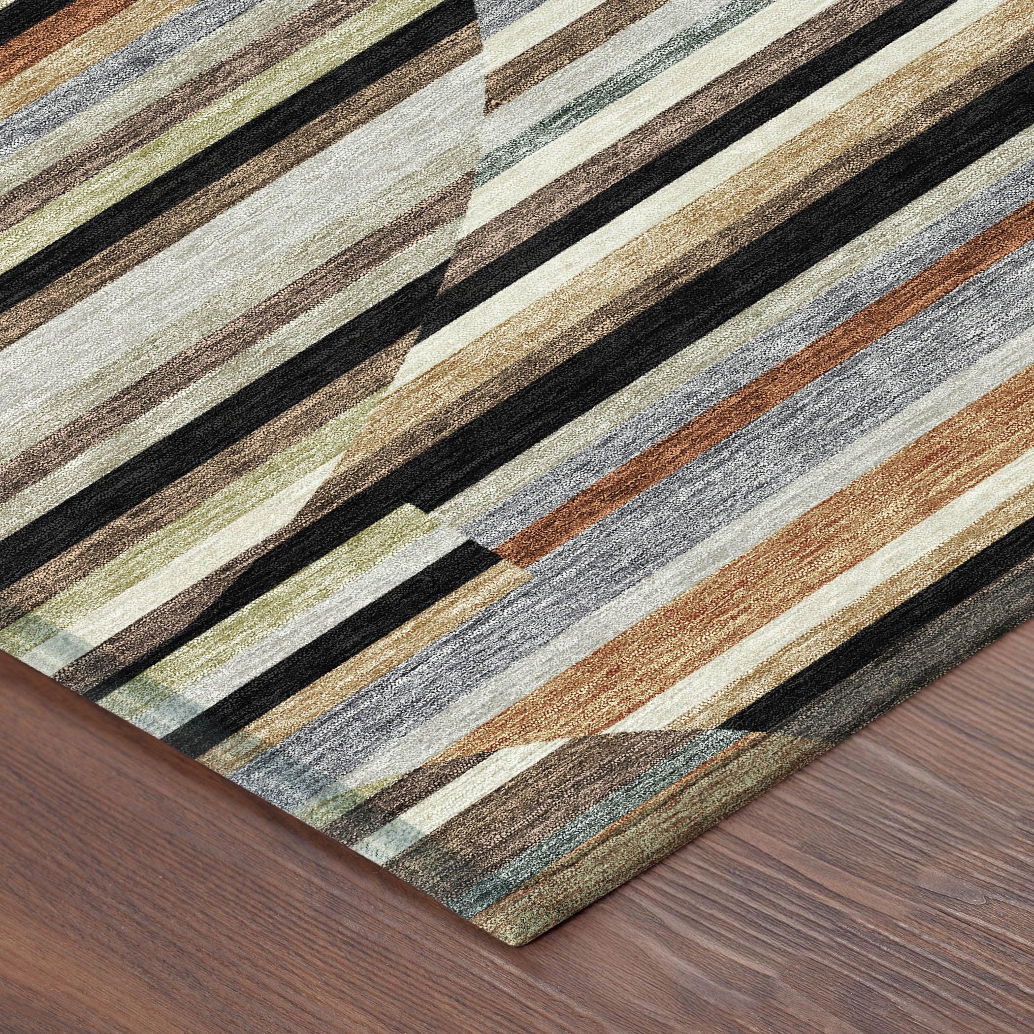 Multicolored striped area rug in earthy tones, featuring a modern abstract design on a soft texture.
