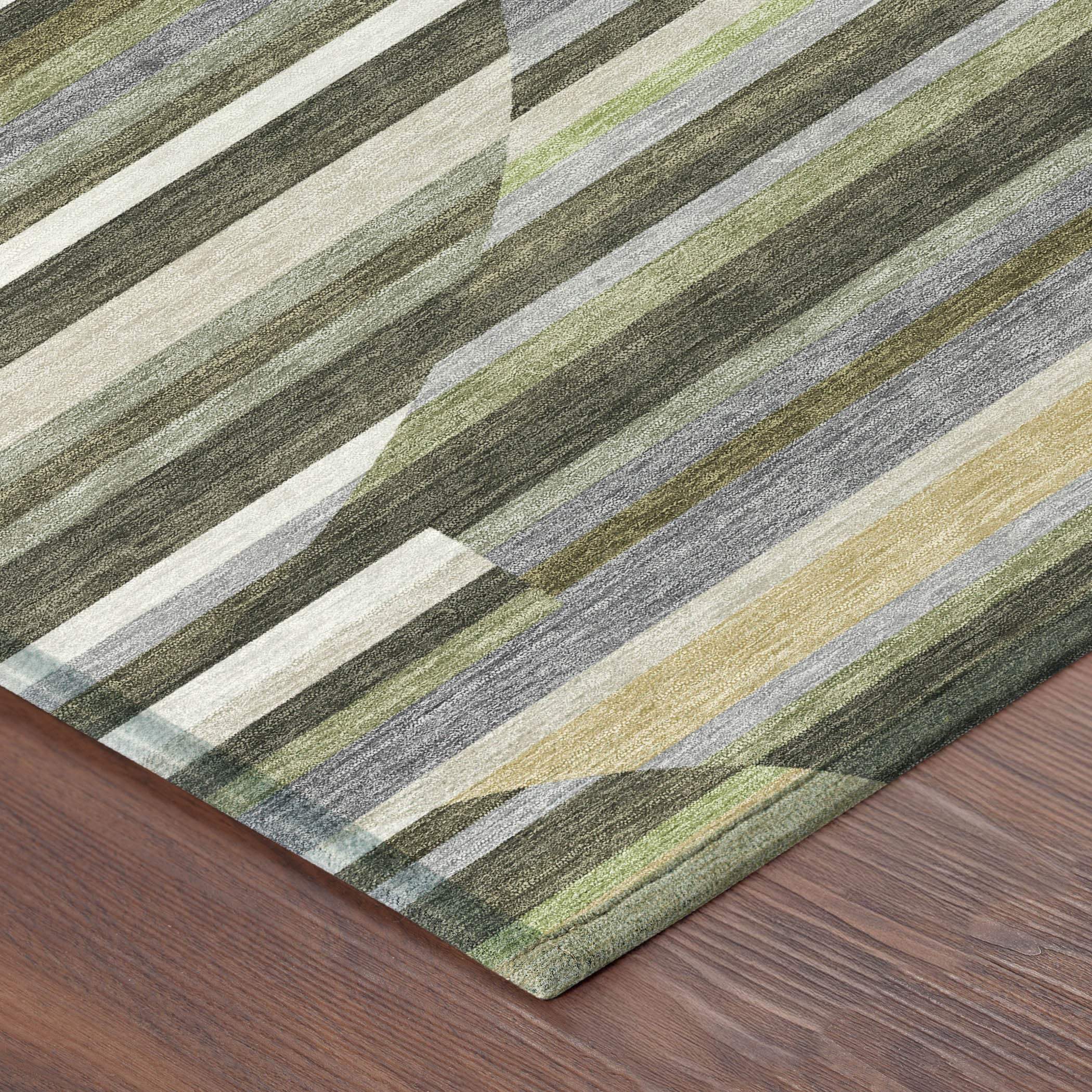 Multicolored striped area rug in green, gray, and beige, crafted from soft, durable materials on a hardwood floor.
