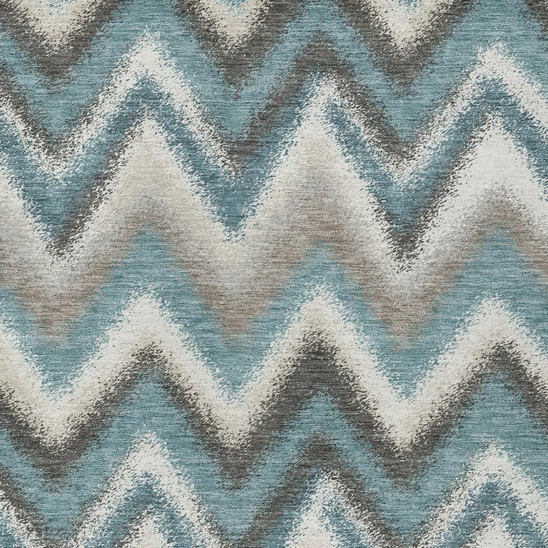 Teal blue and off-white chevron zigzag area rug with charcoal accents