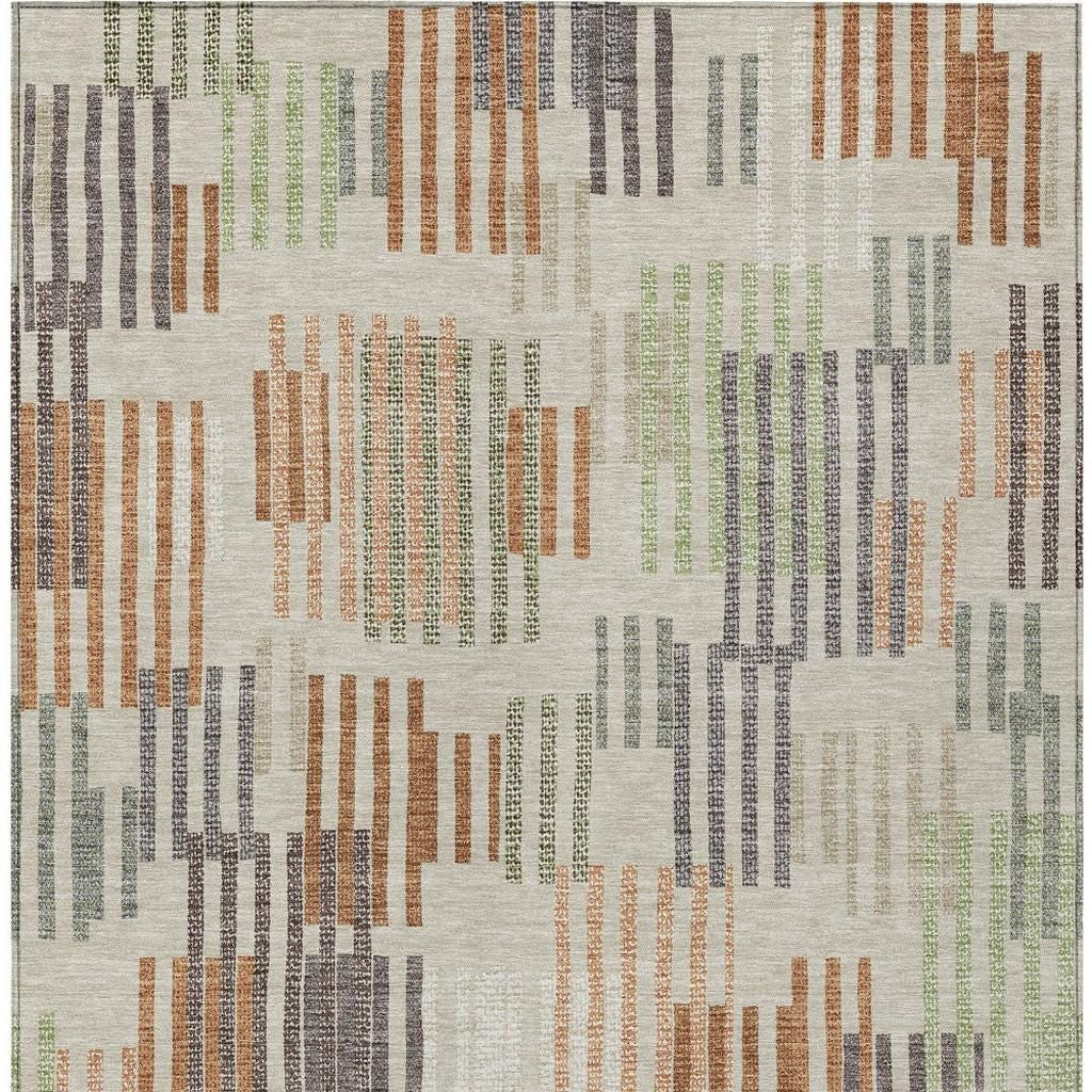 Multicolor abstract area rug in beige, green, orange, and purple, featuring a modern geometric design.