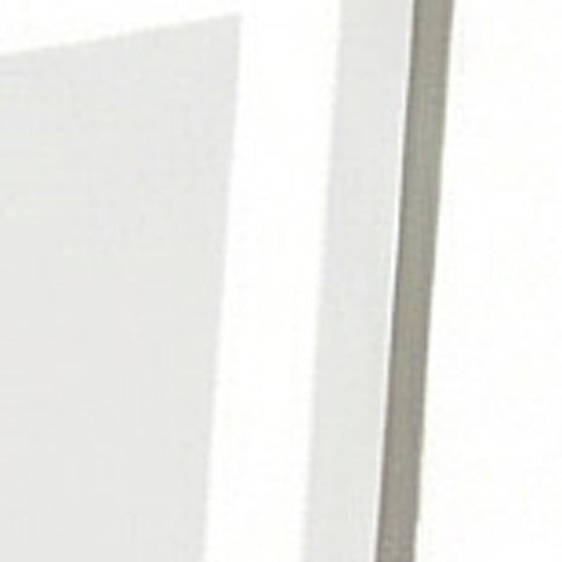 Close-up of silver mirror frame edge with glowing LED light strip