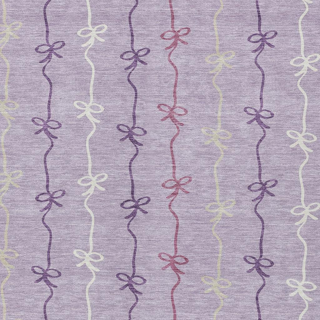 Purple fabric with whimsical pastel bow stripes, perfect for crafts and fashion projects. Ideal for a playful style.