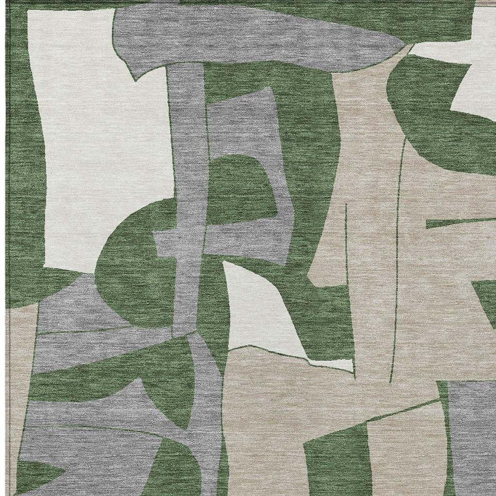 Abstract green and gray area rug, made of durable wool, featuring modern geometric patterns and a soft texture.