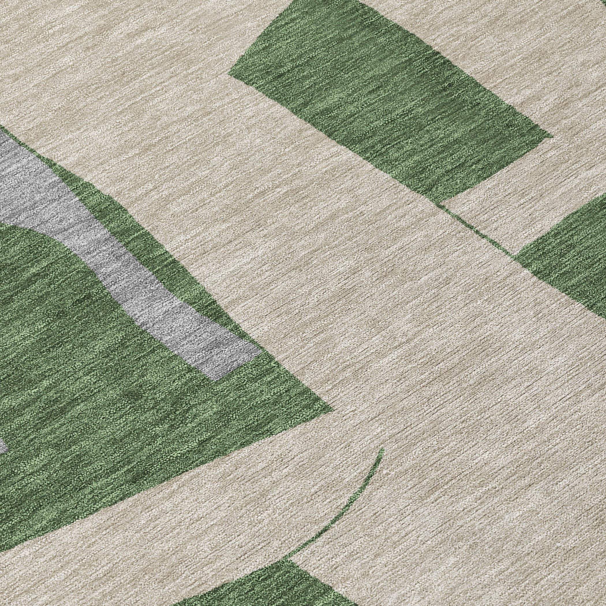 Abstract green and gray area rug on a light beige background, perfect for modern home decor.