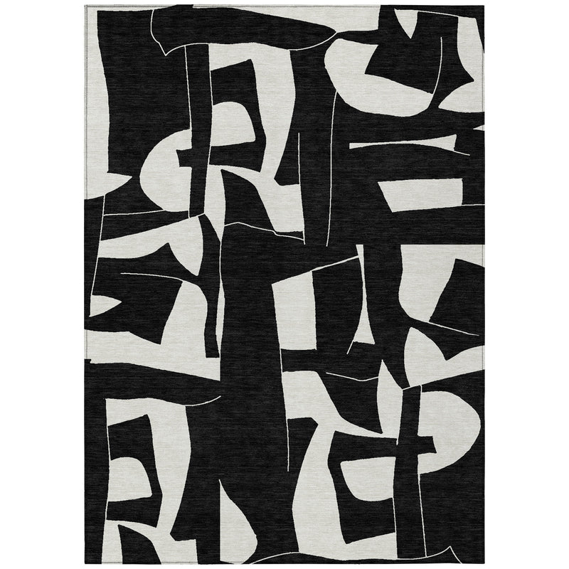 Geometric area rug featuring black panel with large ivory block letters, centered full view