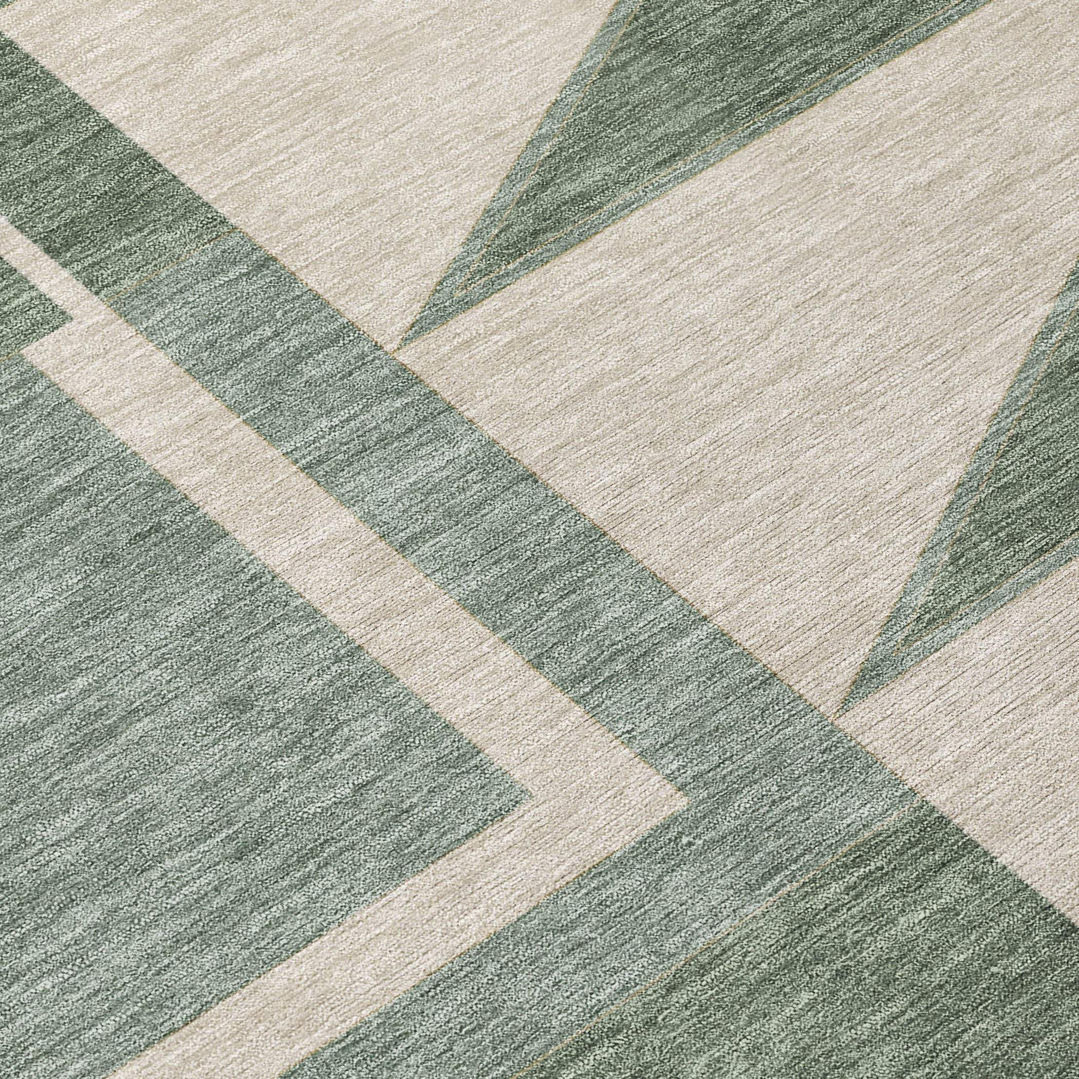 Geometric green and beige area rug, soft texture, perfect for modern home decor.
