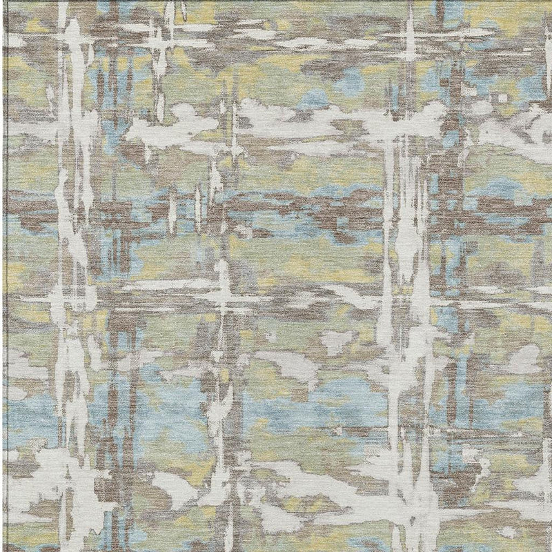 Abstract area rug close-up with distressed vertical and horizontal lines in ivory and blue
