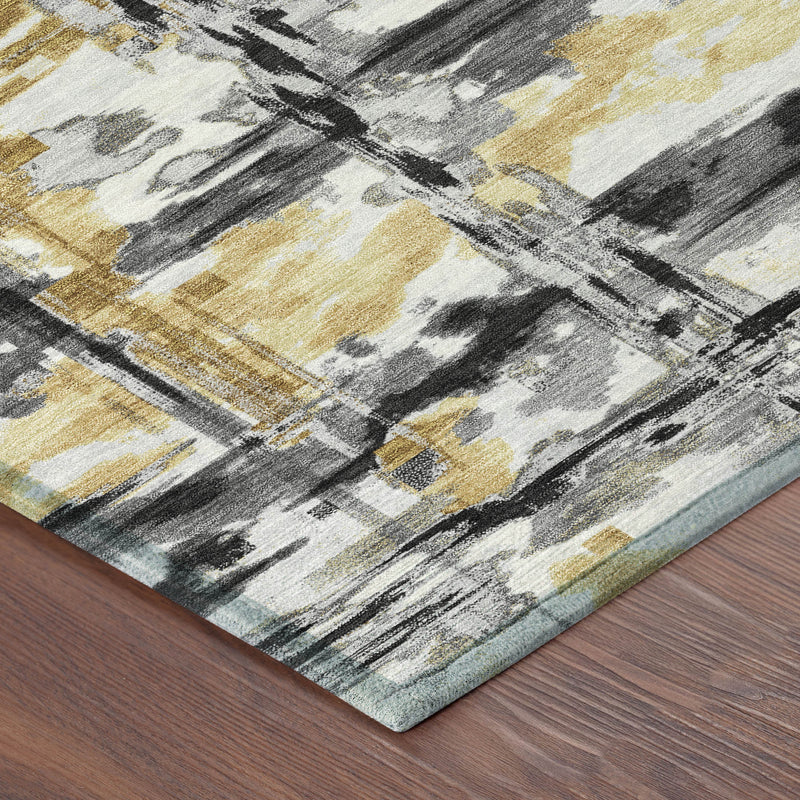 Abstract area rug corner with gray and gold grid pattern and dark edge trim