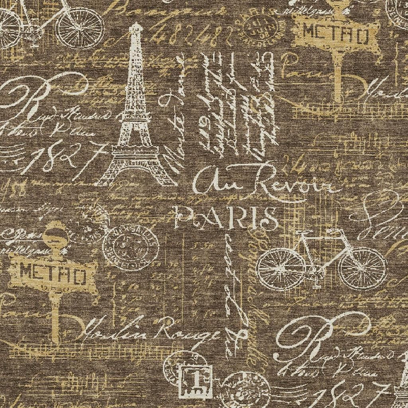 Southwestern area rug close-up, dark brown with white Eiffel Tower and bicycle pattern