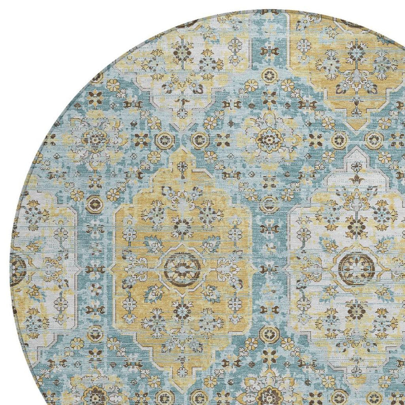 Round damask area rug, light blue field with gold and cream ornamental blocks